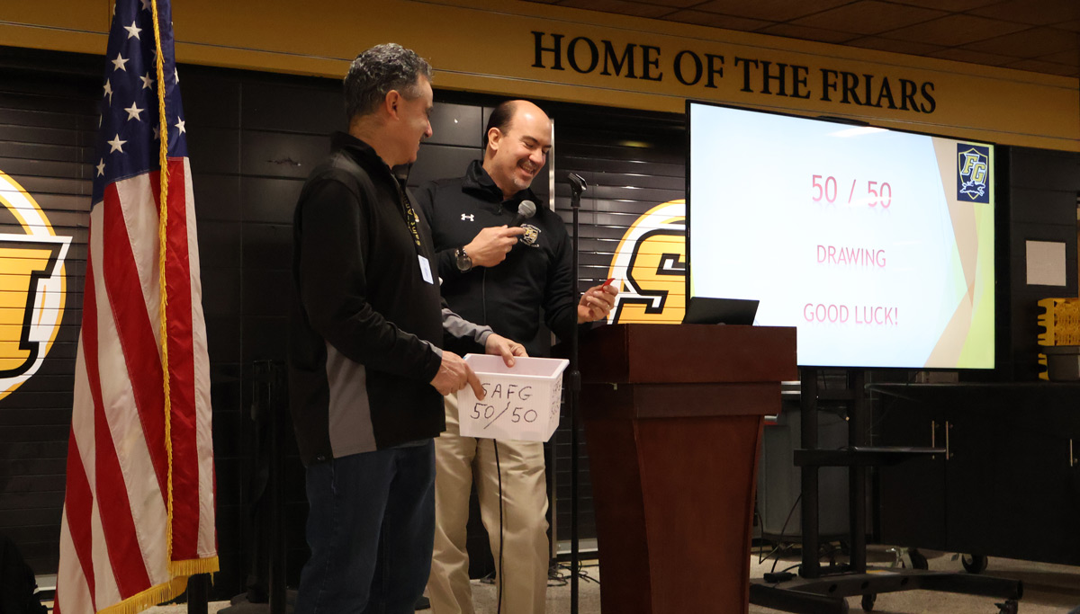 Past and Current Guild Presidents choosing the 50/50 winner at a general meeting